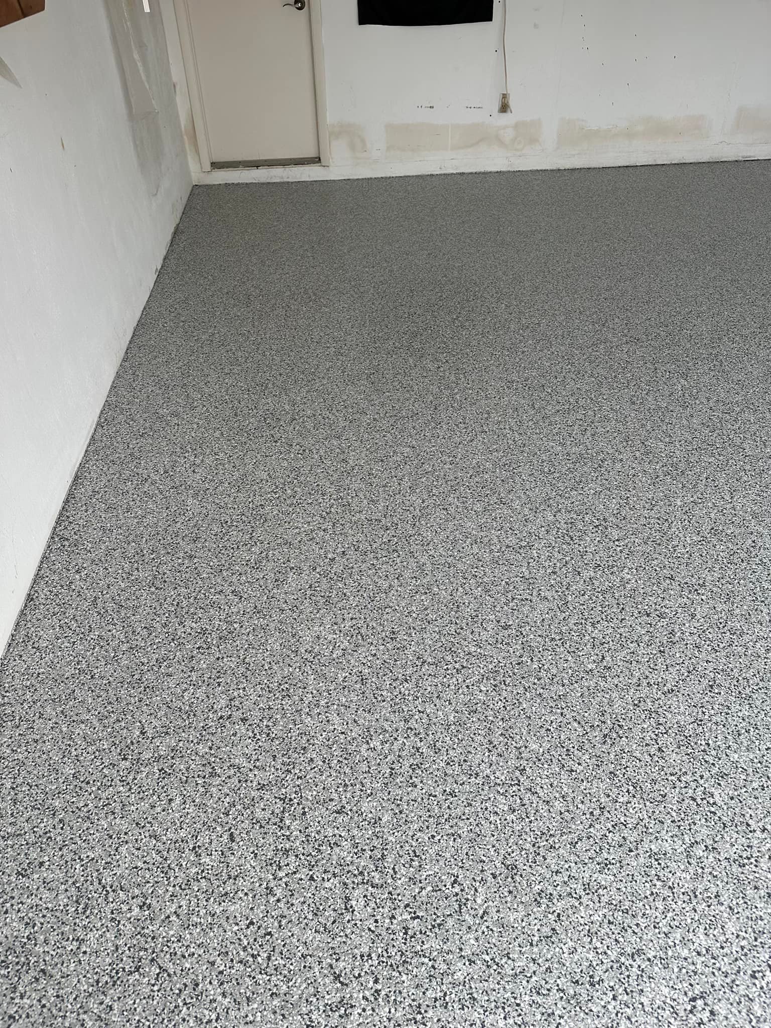 Epoxy flake garage floor close-up finish